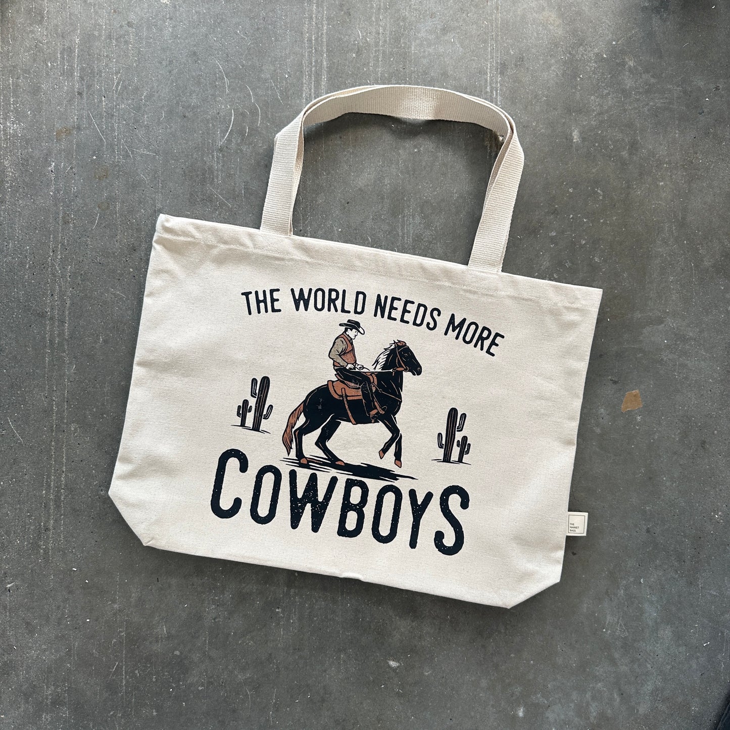 The World Needs More Cowboys Tote Bag