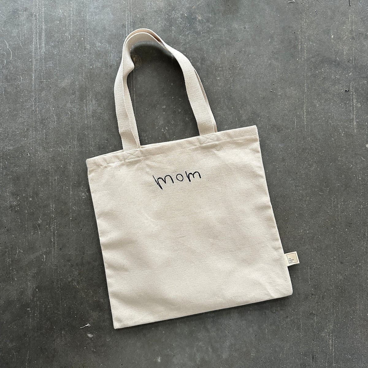 Custom embroidered tote bag with handwriting